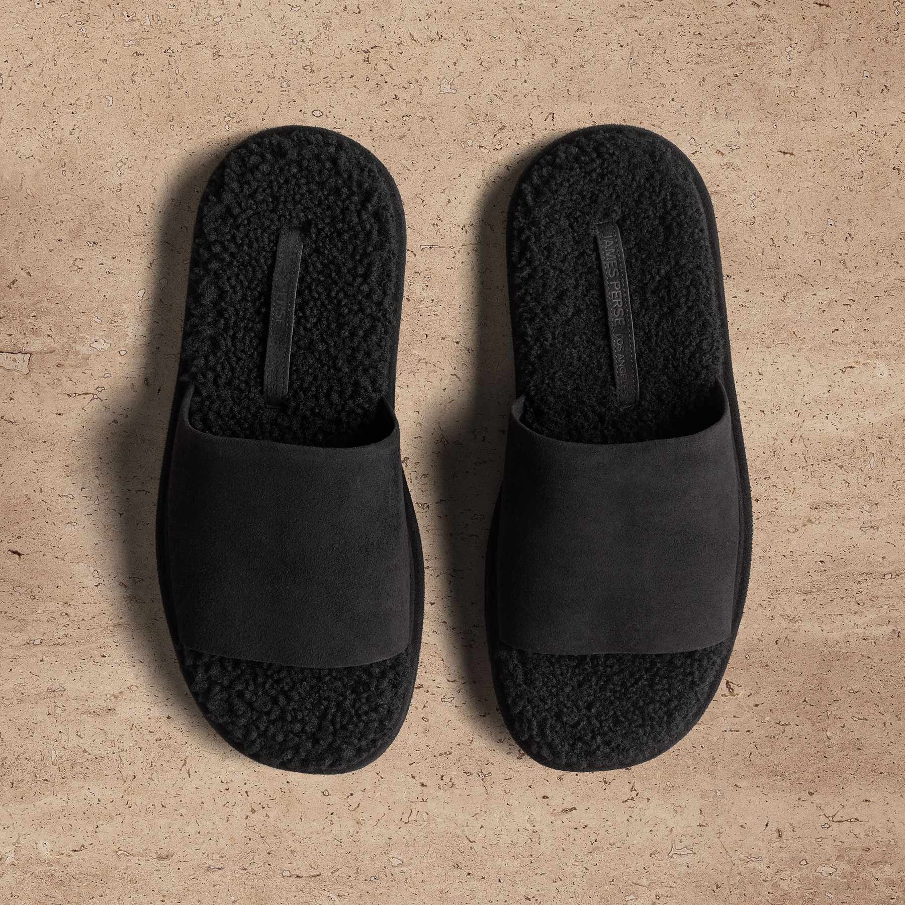 Mules minimalistes en shearling – Noir